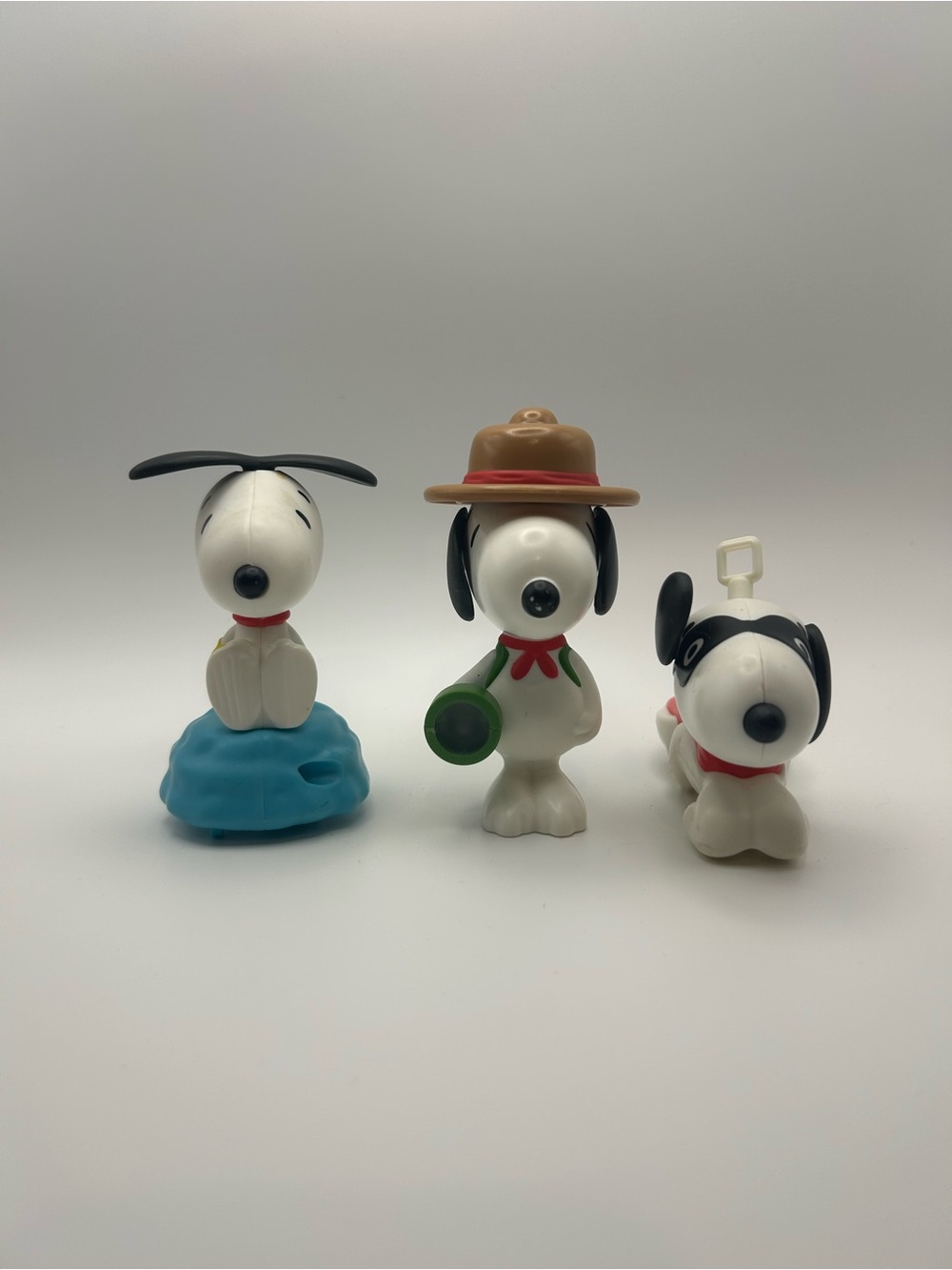 Vintage McDonald’s Snoopy Toy Lot - 3 Figurines in White, Black, Red, Blue
